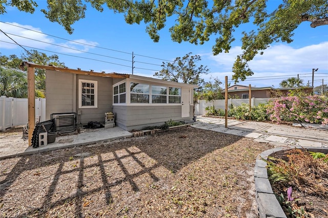 rear view of property with a patio area