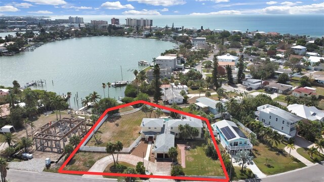 birds eye view of property featuring a water view