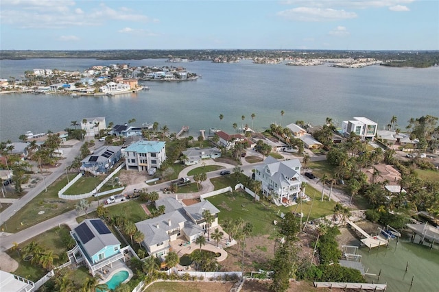 drone / aerial view with a water view