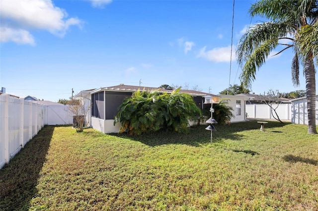 view of yard with a sunroom