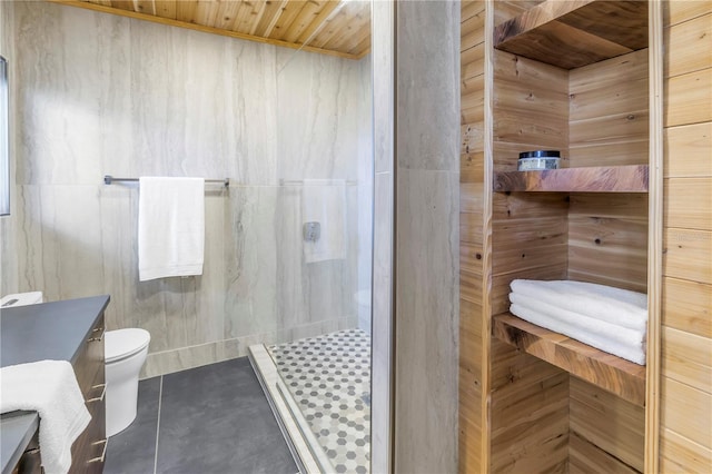 bathroom with vanity, a shower, wooden ceiling, toilet, and wood walls