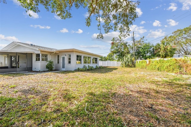 view of yard featuring a sunroom