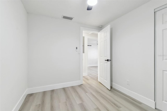 spare room featuring light hardwood / wood-style flooring