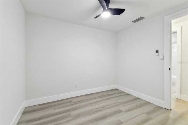 spare room with ceiling fan and light hardwood / wood-style flooring