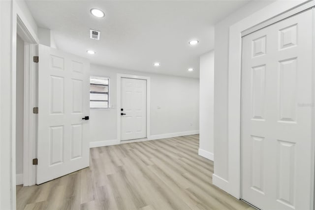 interior space with light hardwood / wood-style flooring