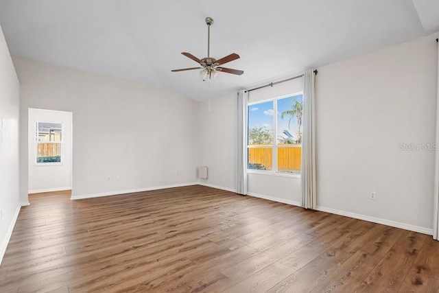 spare room with hardwood / wood-style flooring and ceiling fan