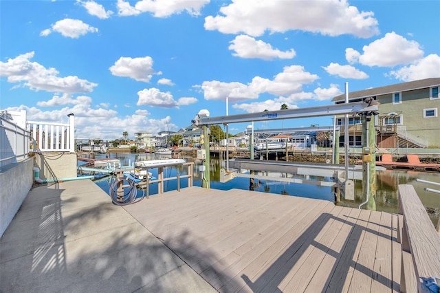 dock area featuring a water view