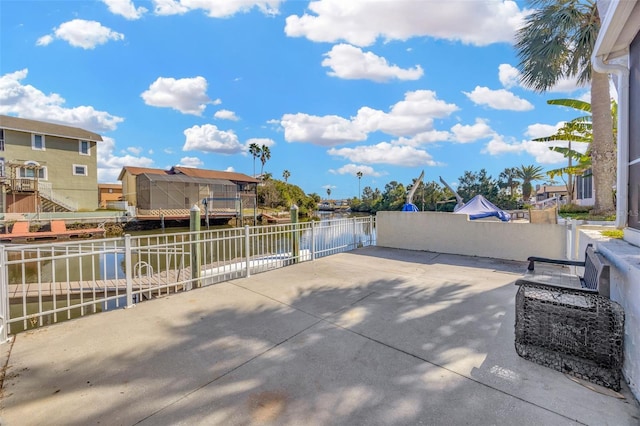 view of patio / terrace featuring a water view