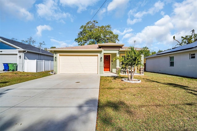 single story home featuring a garage, fence, concrete driveway, stucco siding, and a front yard