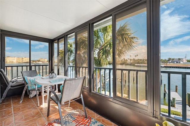 sunroom with a water view