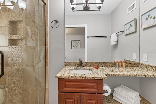 bathroom featuring vanity and walk in shower