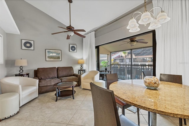 living room with vaulted ceiling, ceiling fan, and light tile patterned flooring