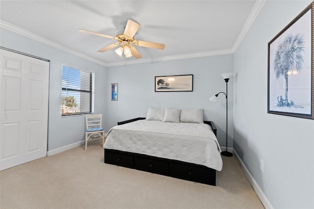 bedroom with carpet flooring, ceiling fan, and ornamental molding