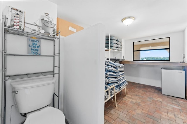 bathroom featuring toilet