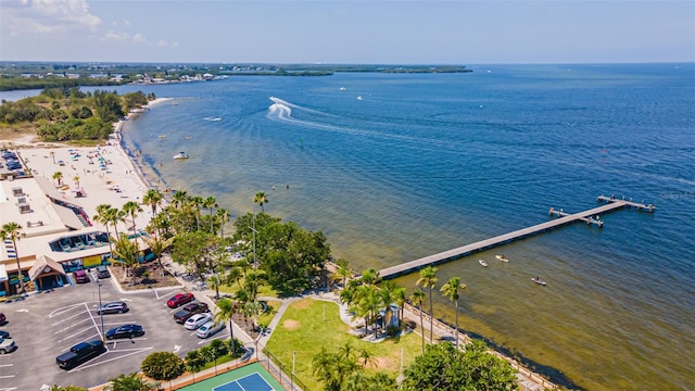 birds eye view of property featuring a view of the beach and a water view
