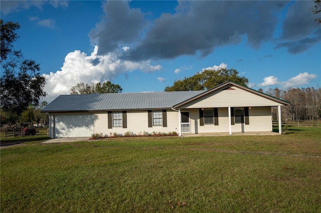 ranch-style house with a porch, a garage, and a front lawn