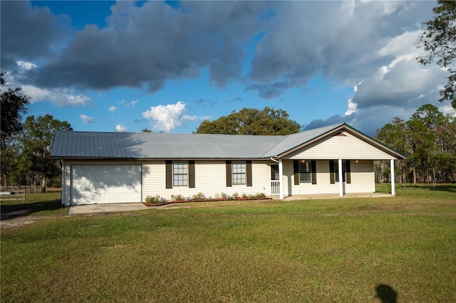 ranch-style house with a front lawn, covered porch, and a garage