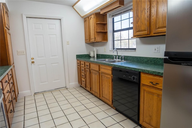 kitchen featuring dishwasher, stainless steel fridge, light tile patterned floors, and sink