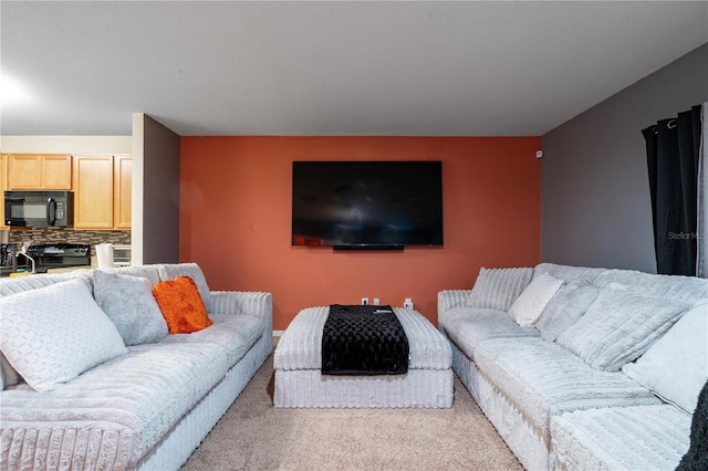 living room featuring light colored carpet