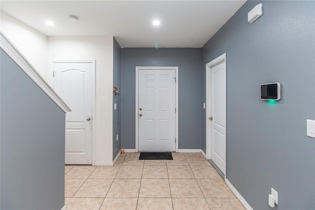 12827 Buffalo Run Dr, Gibsonton, FL 33534 - foyer with light tile patterned floors, baseboards, and recessed lighting