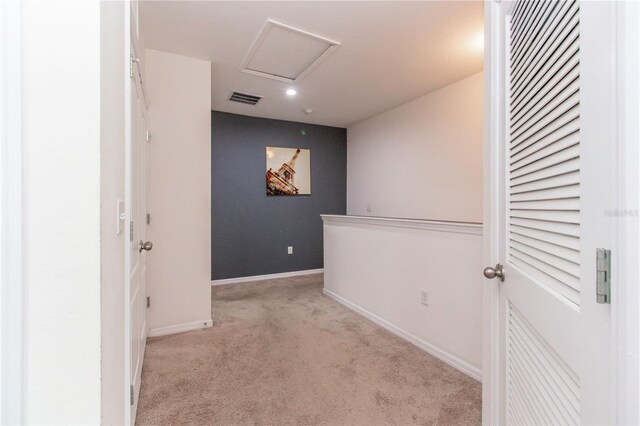 12827 Buffalo Run Dr, Gibsonton, FL 33534 - corridor featuring carpet, baseboards, and attic access