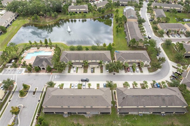 12827 Buffalo Run Dr, Gibsonton, FL 33534 - aerial view of property's location featuring a large body of water, nearby suburban area, and a pool area