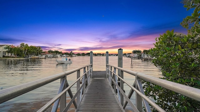 dock area featuring a water view