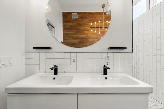 bathroom with backsplash and tile walls