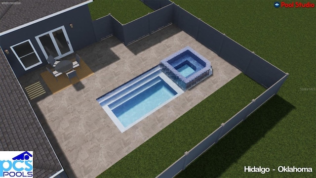 exterior space with an in ground hot tub