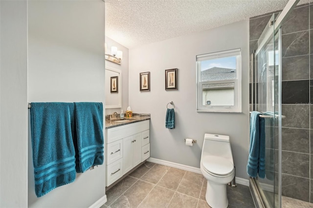 bathroom with vanity, an enclosed shower, toilet, tile patterned floors, and a textured ceiling