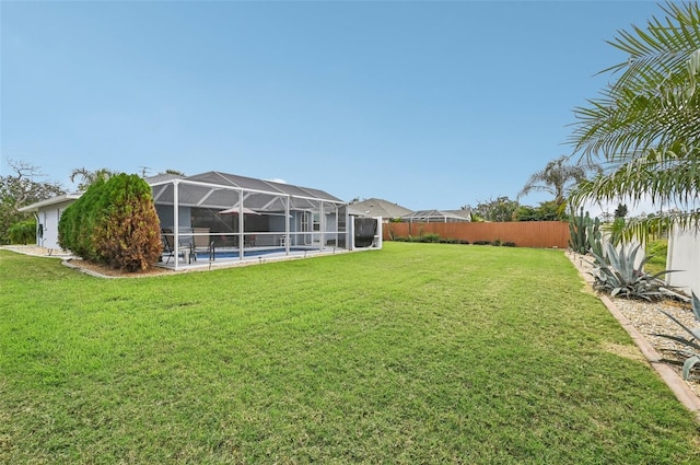 view of yard featuring a lanai