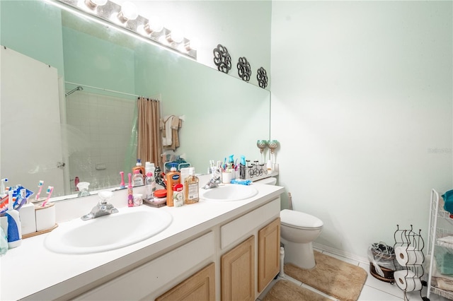 bathroom featuring tile patterned flooring, a shower with curtain, toilet, and vanity