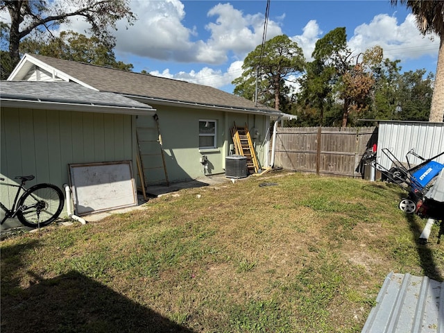 view of yard with central AC