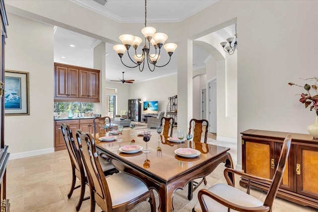 dining room featuring ceiling fan with notable chandelier and ornamental molding