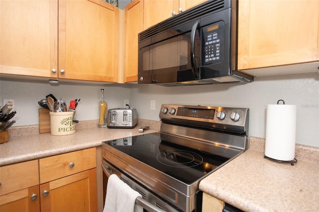 kitchen featuring stainless steel electric stove