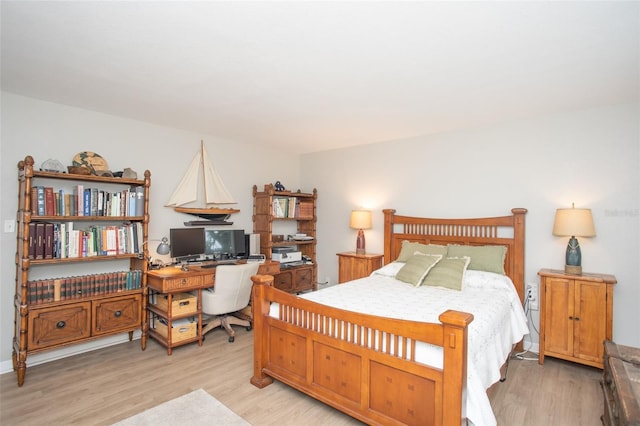 bedroom with light hardwood / wood-style flooring