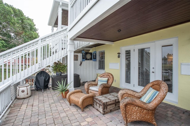 view of patio featuring a grill and central AC