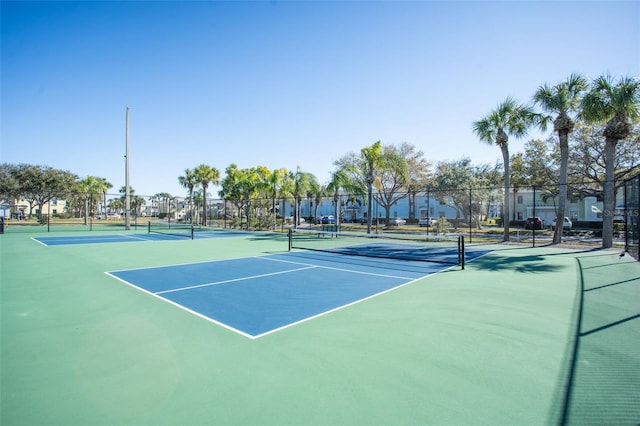 view of sport court with basketball hoop