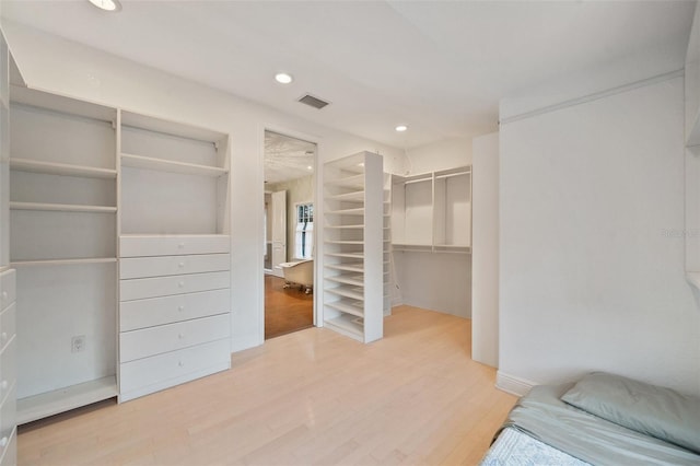 bedroom featuring a closet and hardwood / wood-style floors