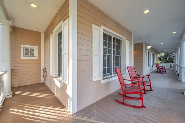 wooden deck featuring covered porch