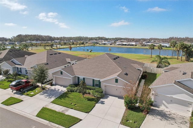 bird's eye view with a water view