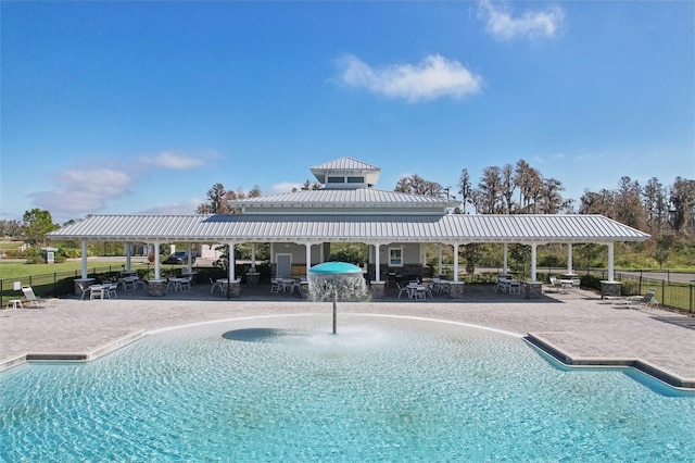 view of swimming pool featuring a patio