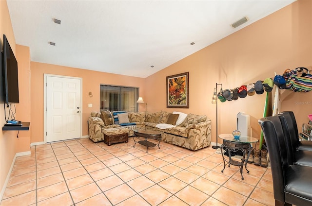 tiled living room with vaulted ceiling