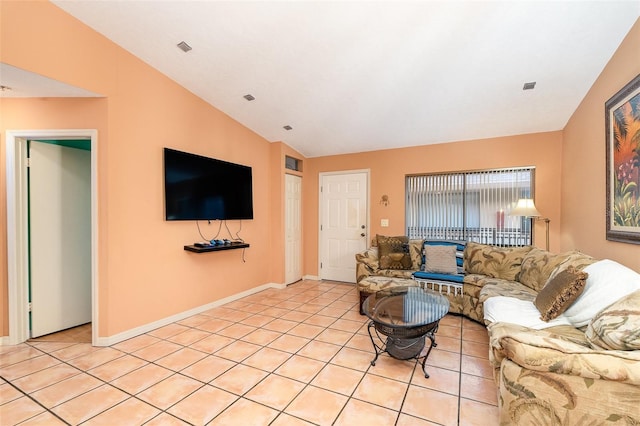 tiled living room with lofted ceiling