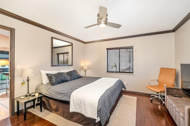 bedroom featuring ceiling fan, dark hardwood / wood-style floors, and crown molding