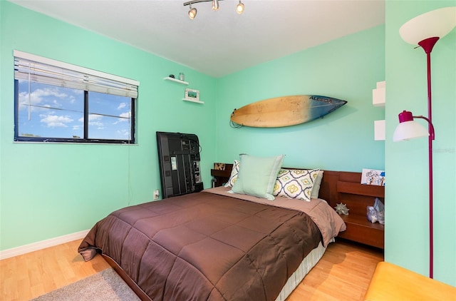 bedroom featuring light wood-type flooring