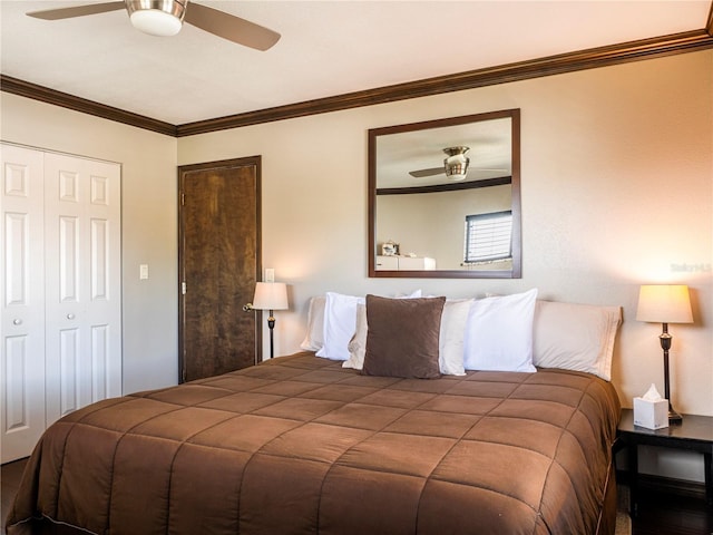 bedroom featuring a closet, crown molding, and ceiling fan