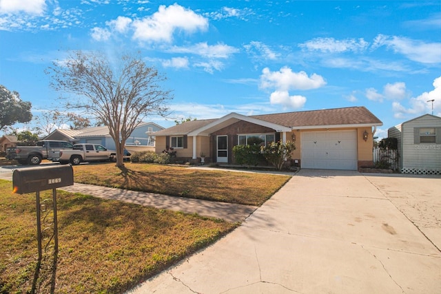 ranch-style house with a front yard and a garage