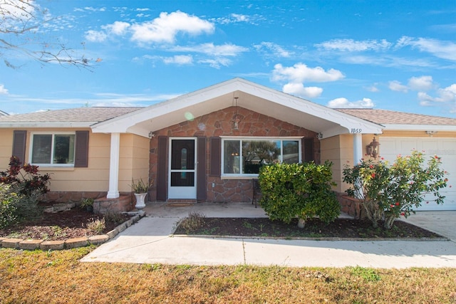 view of front of home with a garage