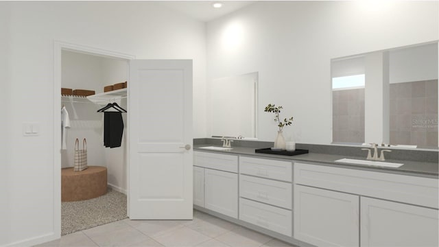 bathroom featuring tile patterned floors and vanity